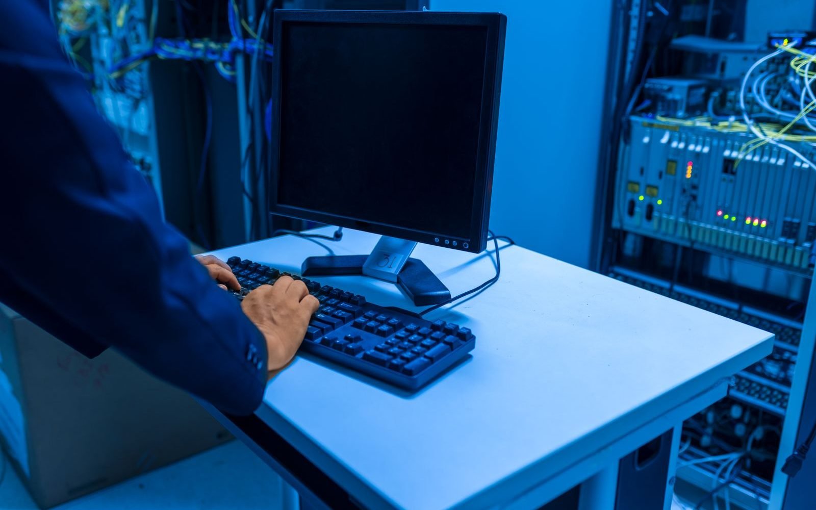 Technician working in a data centre