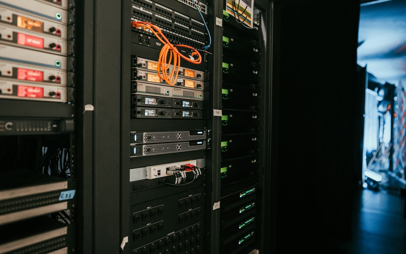 Rows of server racks in a data centre hall